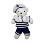 PERSONAGEM EM PELÚCIA URSO BRANCO, VESTIDO COM ROUPA DE MARINHEIRO COM CAMISETA LISTRADA E LAÇO, DISPONÍVEL PARA LOCAÇÃO DE FESTA.